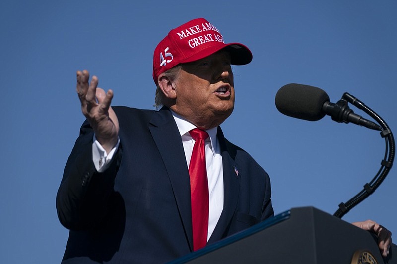 President Donald Trump speaks during a campaign rally at Laughlin/Bullhead International Airport, Wednesday, Oct. 28, 2020, in Bullhead City, Ariz. Trump is painting an apocalyptic portrait of American life if Democrat Joe Biden gets elected. The president claims that if the Democrat takes over, the suburbs wouldn't be the suburbs anymore, the economy would slump into its worst depression ever and police departments would cease to exist. (AP Photo/Evan Vucci)


