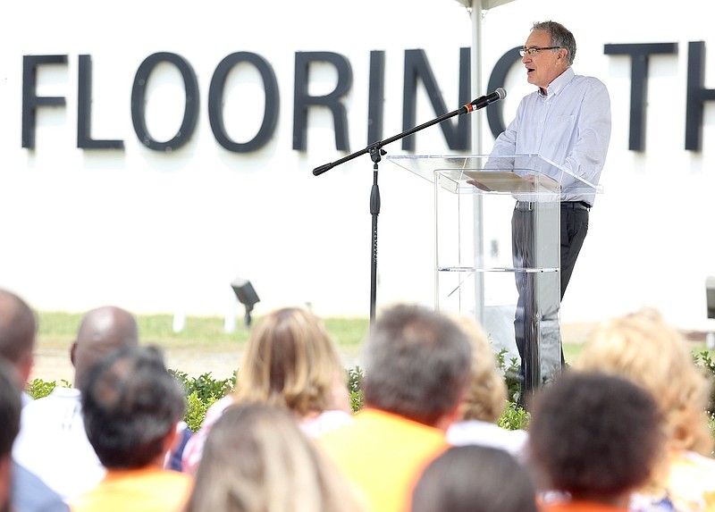 Staff photo by Erin O. Smith / Jeff Lorberbaum, the chairman and chief executive officer of Mohawk Industries, speaks during a flag raising event at Mohawk Industries Wednesday, June 19, 2019 in Calhoun, Georgia. Mohawk raised the largest American flag in Georgia Wednesday.