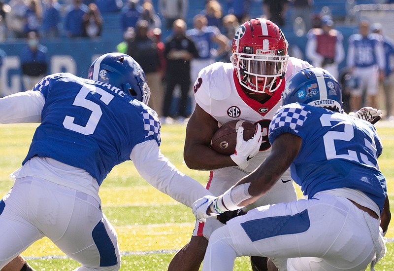 Georgia photo by Mark Cornelison / Georgia redshirt sophomore running back Zamir White punished Kentucky on Saturday with 26 carries for 136 yards and a touchdown during the 14-3 win by the Bulldogs.