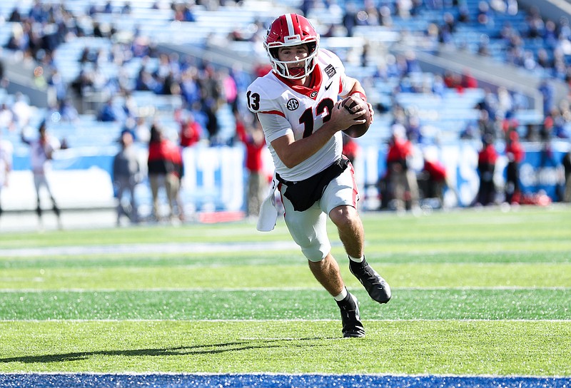 Kentucky Kernel photo by Michael Clubb / Georgia quarterback Stetson Bennett threw two interceptions at Kentucky but outscored the Wildcats with this 2-yard touchdown run in the first quarter of an eventual 14-3 victory.