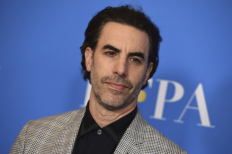 In this Wednesday, July 31, 2019 file photo, Sacha Baron Cohen arrives at the 2019 Hollywood Foreign Press Association's Annual Grants Banquet at the Beverly Wilshire Beverly Hills, Calif. Actor Sacha Baron Cohen, who stars in "Borat Subsequent Moviefilm," donated $100,000 to the church of a woman who believed she was taking part in a documentary but instead was being featured in the mockumentary comedy film. (Photo by Jordan Strauss/Invision/AP, File)
