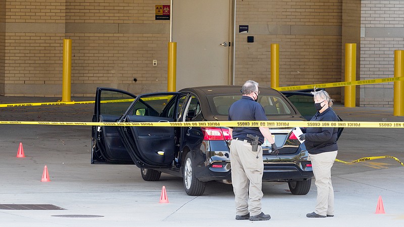 Law enforcement investigate after a shooting. CHI Memorial Hospital was put on lockdown on Saturday, Oct. 31, 2020 in Chattanooga, Tenn. / Staff photo by C.B. Schmelter
