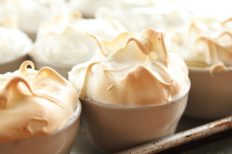 Contributed Photo by Kris D'Amico Photography / The banana pudding at Southern Star is spooned into individual bowls before the meringue is baked to a golden finish. Owners Rick and Nancy Adams say banana pudding has been a top menu item since they opened their downtown Chattanooga restaurant 20 years ago.