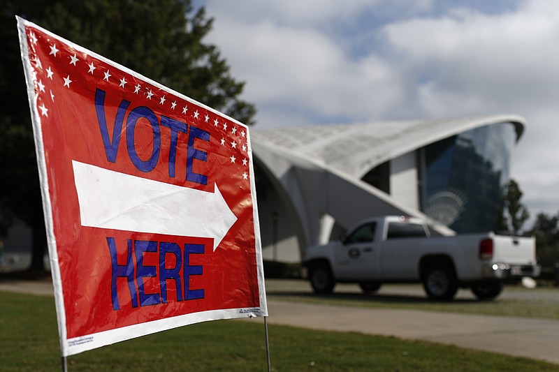 Stegeman Coliseum on the campus of the University of Georgia opened for early voting on Tuesday, Oct. 27, 2020 in Athens, Ga. The Coliseum will be open Oct. 27-29 to all Clarke County voters for early voting. (Joshua L. Jones /Athens Banner-Herald via AP)