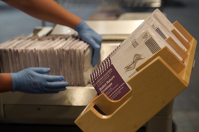 Envelopes containing ballots are shown at a San Francisco Department of Elections at a voting center in San Francisco, Sunday, Nov. 1, 2020.