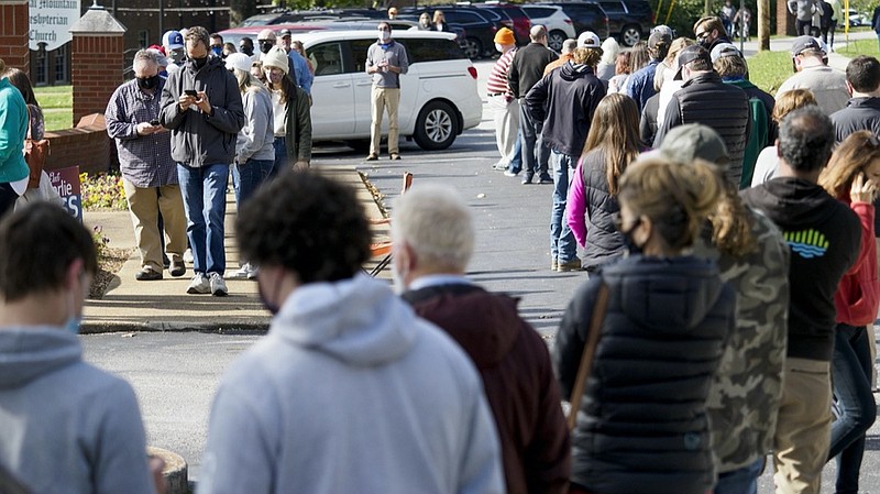 Staff photo by C.B. Schmelter / People wait in line to vote at Signal Mountain Presbyterian Church on Tuesday, Nov. 3, 2020 in Signal Mountain, Tenn.