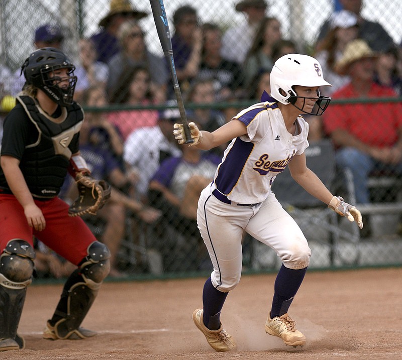 Staff Photo by Robin Rudd/ Sequatchie's Ella Edgmon (1) hits to first after slapping a hit agatinst Lexinton. The TSSAA Softball Tournament was held at the Starplex in Murfreesboro on May 21, 2019.