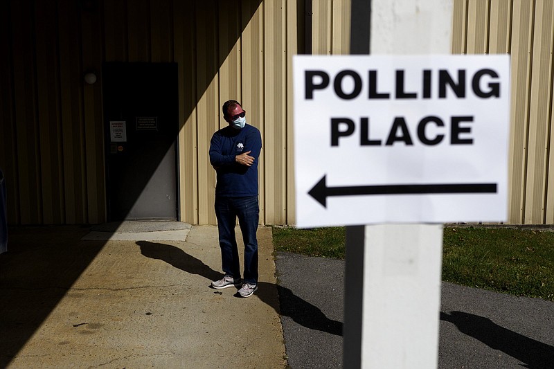 Staff Photo by C.B. Schmelter / Benton Bilbrey waits in line to vote at Mountain Creek Church of Christ on Election Day in Chattanooga, Tenn.