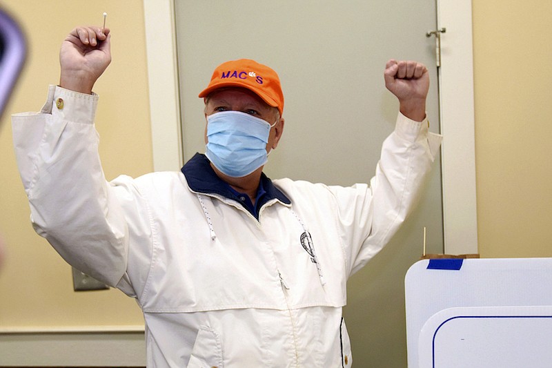 Republican U.S. Sen. Lindsey Graham reacts after marking his ballot electronically while voting in the general election, Tuesday, Nov. 3, 2020, at the Corinth-Shiloh Fire Dept. in Seneca, S.C. (AP Photo/Richard Shiro)