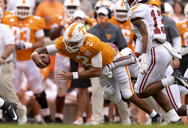 Tennessee Athletics photo by Andrew Ferguson / Tennessee fifth-year senior quarterback Jarrett Guarantano dives for extra yardage during the 48-17 loss to Alabama on Oct. 24.