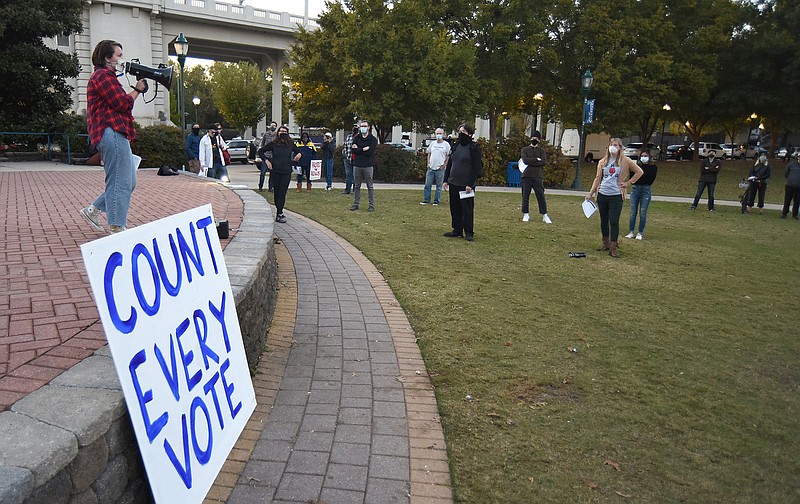 Staff Photo by Matt Hamilton / Sierra White of Chattanooga speaks at Coolidge Park on Wednesday, Nov. 4, 2020. About 75 people gathered for the "Rally for Democracy."