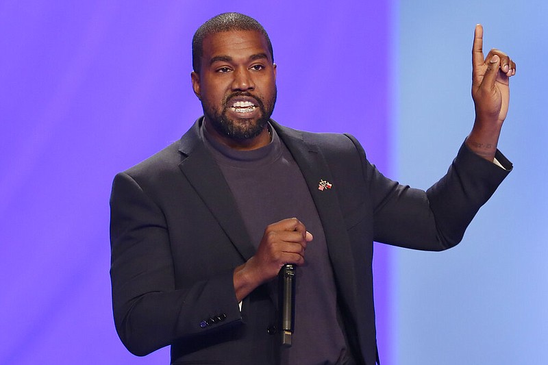 FILE - In this Sunday, Nov. 17, 2019, file photo, Kanye West answers questions during a service at Lakewood Church, in Houston. (AP Photo/Michael Wyke, File)