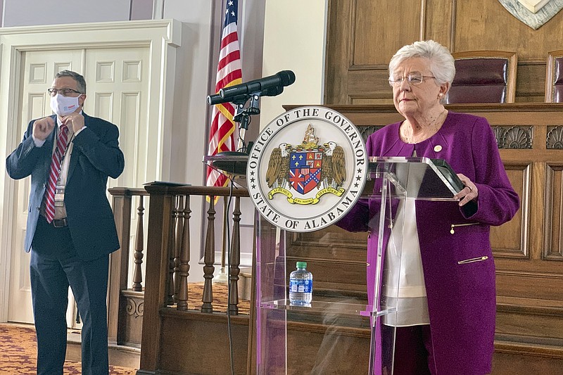 Alabama Gov Kay Ivey announces that a statewide mask order will be extended through Oct. 2, 2020 during a press conference at the Alabama Capitol in Montgomery, Ala., on Thursday, Aug. 27, 2020. Ivey said the state is seeing a drop in COVID-19 cases and that the requirement to wear masks will keep the numbers moving downward. (Kim Chandler/Associated Press)