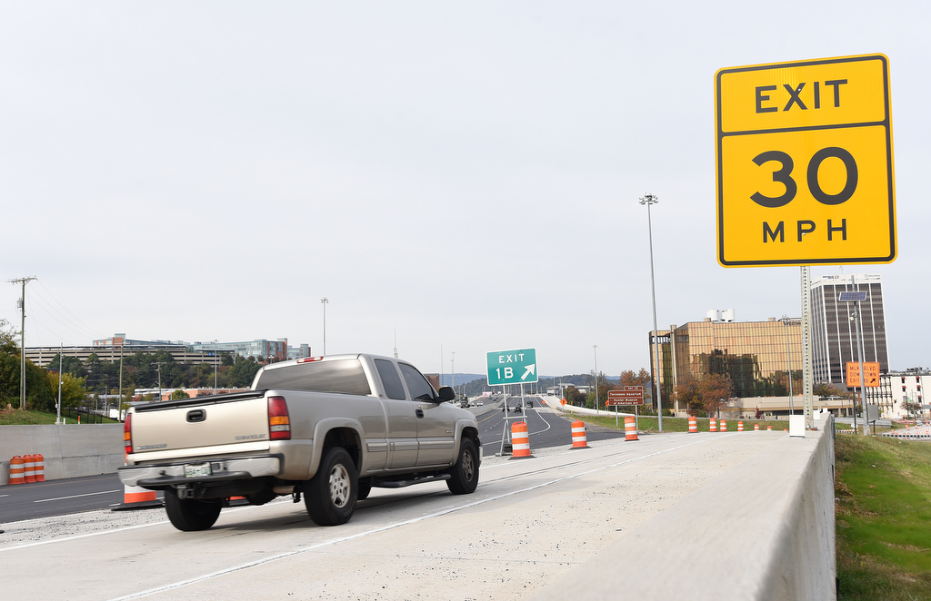 Staff Photo by Matt Hamilton / A truck takes an exit toward M.L. King Boulevard off of U.S. Highway 27 on Thursday, Nov. 5, 2020. Construction crews on the $143.2 million U.S. Highway 27 improvement project in downtown Chattanooga are working on the last details and are on schedule to complete the project by the end of the year. Dement Construction Co., LLC is the contractor on the project that started in late 2015.