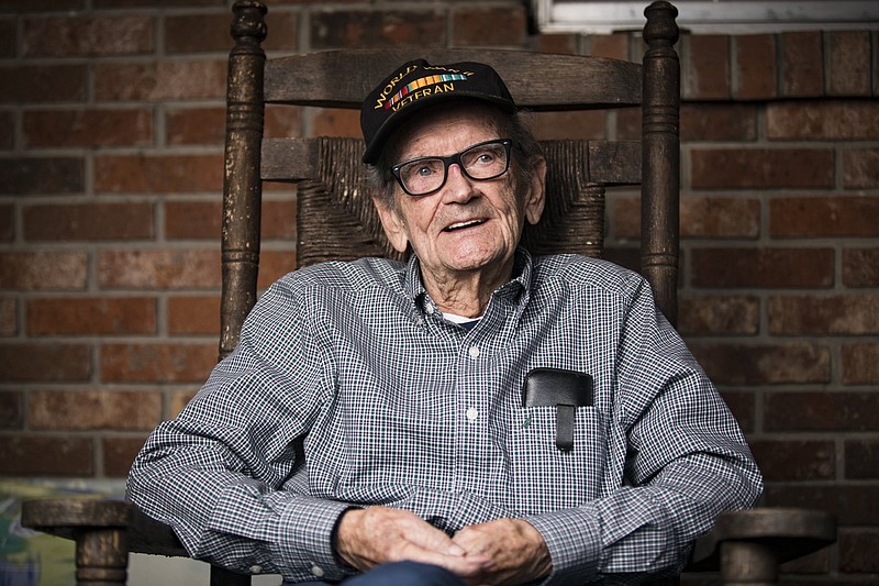 Staff photo by Troy Stolt / World War II veteran James Carl Morgan poses for a portrait at his home in Rossville. Morgan served as a medic in the U.S. Navy during the war.