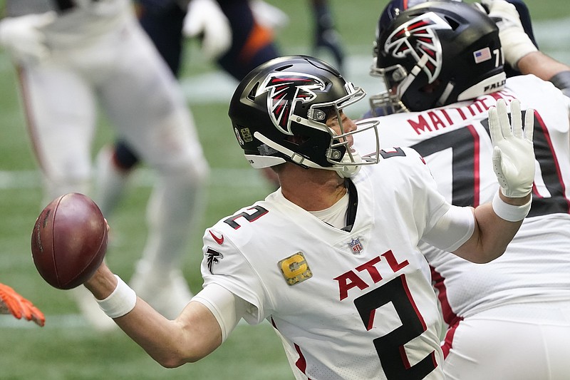FILE - Atlanta Falcons quarterback Matt Ryan (2) works in the pocket during the second half of an NFL football game against the Denver Broncos, Sunday, Nov. 8, 2020, in Atlanta. (AP Photo/John Bazemore)