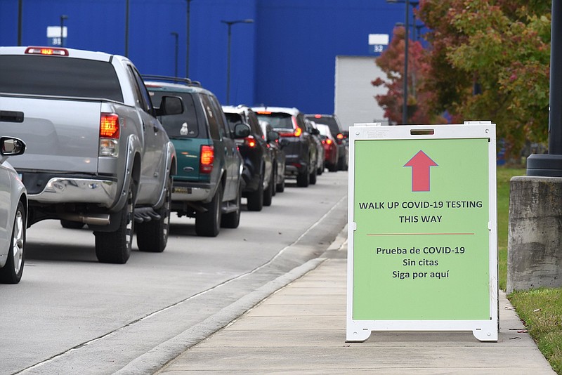 Staff Photo by Matt Hamilton / Vehicles form a line at the COVID-19 testing site at 1125 Riverfront Parkway on Tuesday, Nov. 10, 2020. 