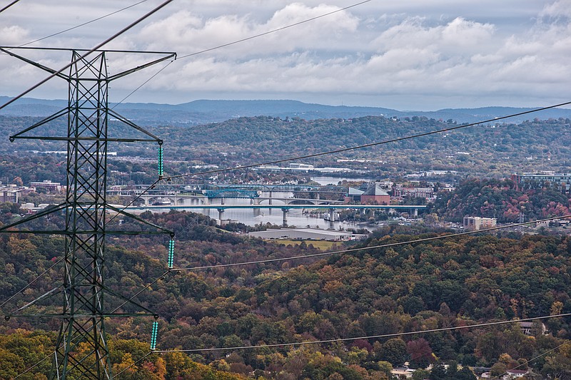 Contributed photo by the Tennessee Valley Authority / TVA operates 16,300 miles of transmission lines to deliver power across its 7-state region, including the 161,000-volt line pictured here atop Raccoon Mountain overlooking downtown Chattanooga.