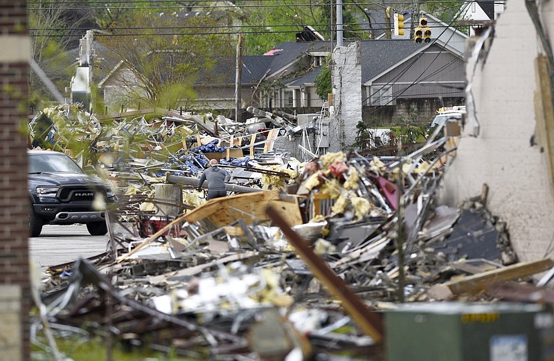 Staff Photo by Robin Rudd / The destroyed Bones Smokehouse in the 7600 block of East Brainerd Road is in the foreground, while the rubble of Advanced Auto Parts is in the background. The Chattanooga Area was hit by EF 3 tornado on the night of April 12, 2020.