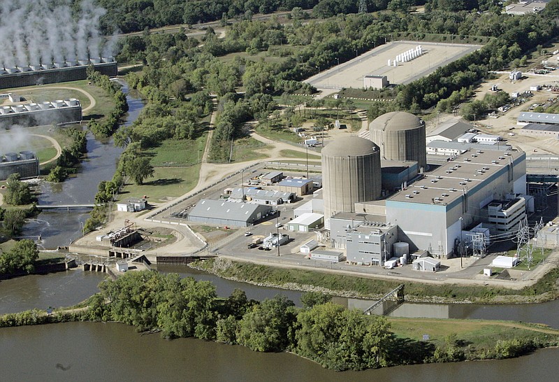 This Sept. 23, 2005 file photo shows the Prairie Island nuclear power plant near Red Wing, Minn. The U.S. Department of Energy announced in November 2020 it has awarded just under $14 million for an attempt to build a hydrogen-energy producing facility with the help of a nuclear research lab in Idaho. The Idaho National Laboratory and Minneapolis-based Xcel Energy will work on devising and building the facility, most likely at Xcel Energy's Prairie Island Nuclear Generating Station. AP Photo/Jim Mone,File)