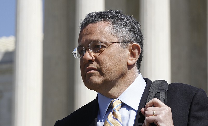 CNN legal analyst Jeffrey Toobin leaves the Supreme Court after it finished the day's arguments on the health care law signed by President Barack Obama in Washington on March 27, 2012. The New Yorker has parted ways with longtime staff writer Toobin after he reportedly exposed himself during a Zoom conference last month. He had already been on suspension and is also on leave from CNN, where he has been a legal commentator. (AP Photo/Charles Dharapak, File)