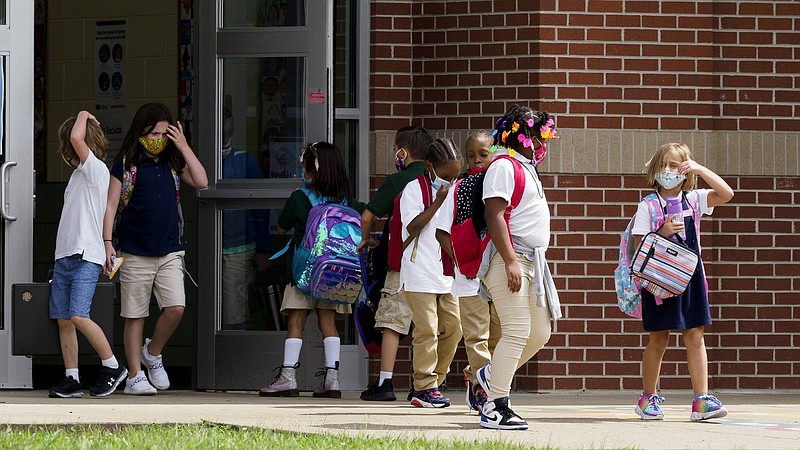 Staff photo by C.B. Schmelter / Students leave Battle Academy on Monday, Aug. 31, 2020 in Chattanooga, Tenn. Monday marked the first day of a two week trial period for Hamilton County Schools' Phase 3 scheduling.