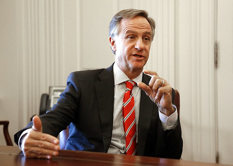 FILE - In this Tuesday, Dec. 18, 2018, file photo, outgoing Tennessee Gov. Bill Haslam answers questions during an interview in Nashville, Tenn. (AP Photo/Mark Humphrey, File)