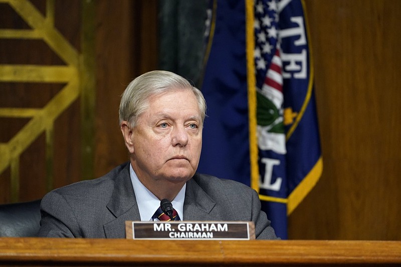 Sen. Lindsey Graham, R-S.C., arrives for a Senate Judiciary Committee hearing on Capitol Hill in Washington, Tuesday, Nov. 10, 2020, on a probe of the FBI's Russia investigation. (AP Photo/Susan Walsh, Pool)