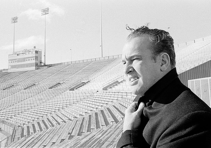 AP photo by Charles Knoblock / Green Bay Packers halfback Paul Hornung takes a look at the team's chilly Lambeau Field on Christmas in 1965, the day before a home playoff game against the Baltimore Colts.