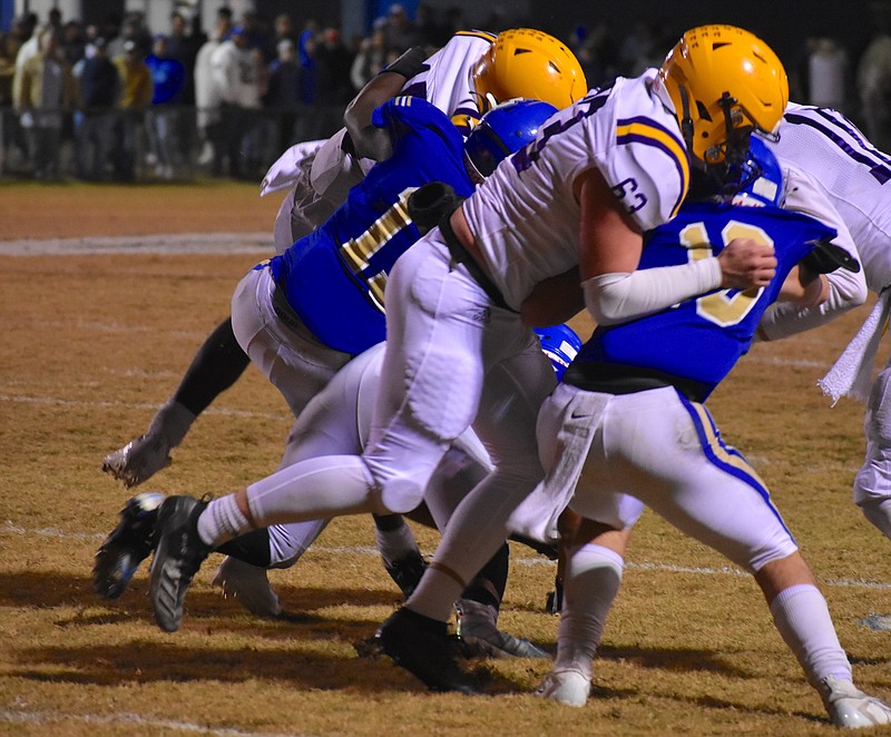 Staff photo by Patrick MacCoon / Bledsoe County junior Gunner Sweatt makes a tackle during the first half of Friday night's home playoff game against Trousdale County. He had eight stops and a fumble recovery in the first half.