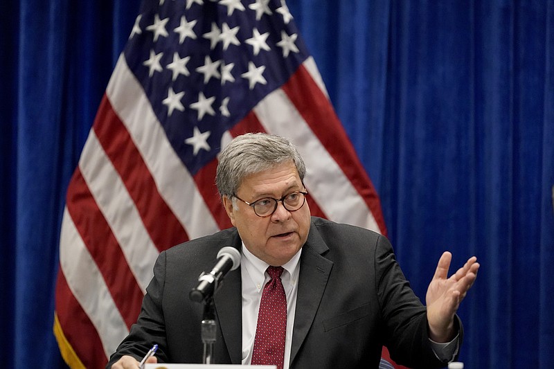 In this Oct. 15, 2020, file photo U.S. Attorney General William Barr speaks during a roundtable discussion on Operation Legend in St. Louis. Even before Barr issued a memo that authorized federal prosecutors across the country to investigate "substantial allegations" of voting irregularities if they exist, the Justice Department had already begun looking into two specific allegations. (AP Photo/Jeff Roberson, File)