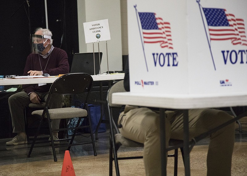 Staff photo by Troy Stolt / A Hamilton County Election official sits in the Brainerd Baptist Crossroad church polling location after voting in the 2020 election on Tuesday, Nov. 3, 2020 in Chattanooga, Tenn.