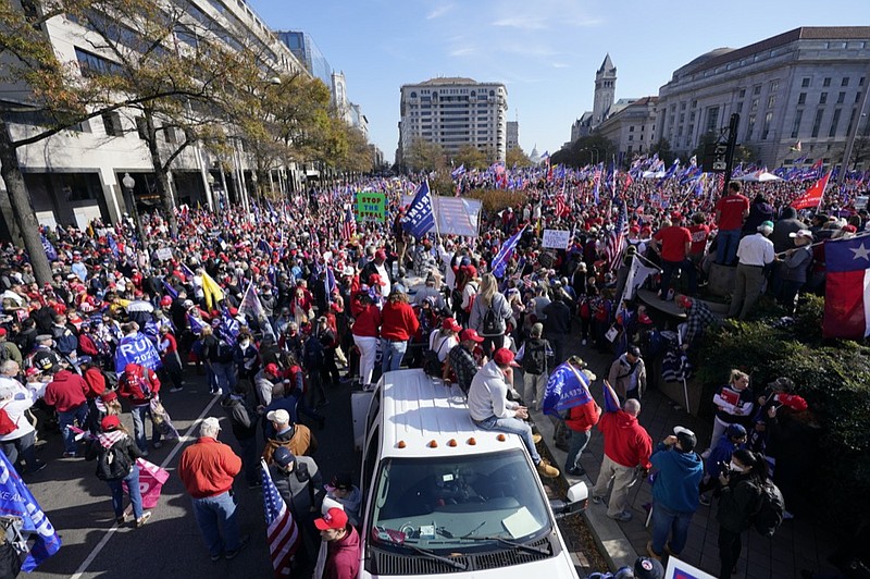 Supporters of President Donald Trump rally at Freedom Plaza on Saturday, Nov. 14, 2020, in Washington. (AP Photo/Julio Cortez)


