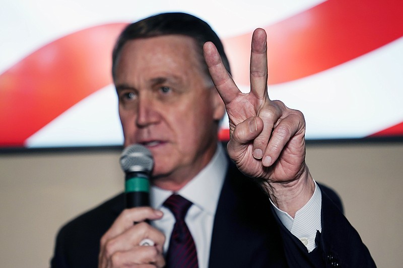 Republican candidate for U.S. Senate Sen. David Perdue speaks during a campaign rally on Friday, Nov. 13, 2020, in Cumming, Ga. Perdue and Democratic candidate Jon Ossoff are in a runoff election for the Senate seat in Georgia. (AP Photo/Brynn Anderson)