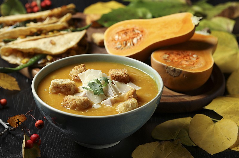 The squash and leek soup is bolstered by other aromatics, garlic and onion, along with a hit of heat from red chile. Serve cheesy quesadillas on the side for a fantastic fall dinner. / Photo by Abel Uribe/Chicago Tribune/TNS