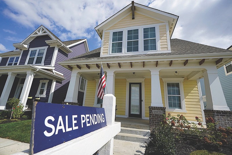 File photo by Michael Conroy, AP / A "sale pending" sign is posted on a home as demand for homes rises amid a tight supply of houses in Chattanooga. Median home prices in Chattanooga rose 16.4% from the third quarter of 2019 to the third quarter of 2020.