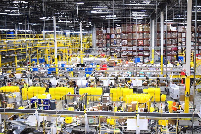 Staff Photo by Robin Rudd / The huge Amazon fulfillment center processes orders in the Enterprise South facility.   Amazon has taken steps to combat the coronavirus and safeguard the health of the workers at their CHA1 fulfillment center.  