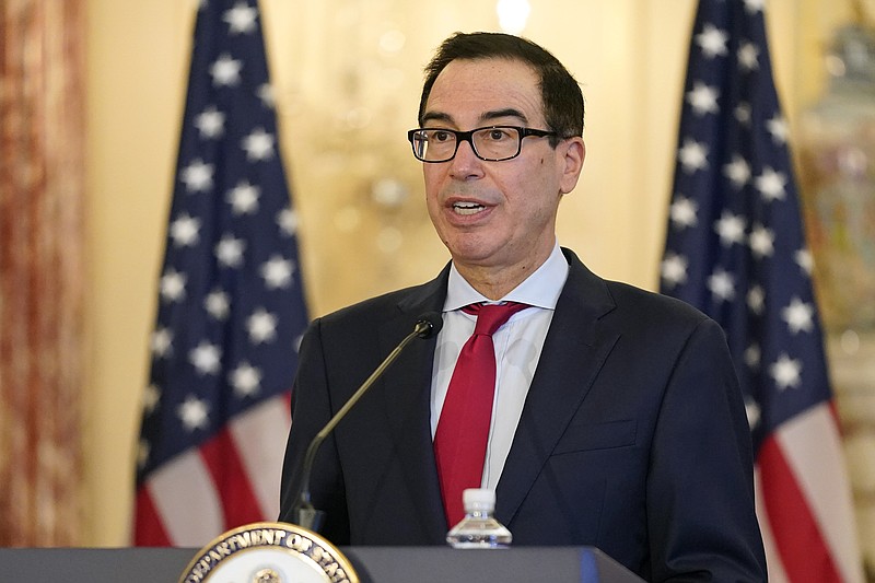 FILE - In this Monday, Sept. 21, 2020 file photo, Treasury Secretary Steve Mnuchin speaks during a news conference to announce the Trump administration's restoration of sanctions on Iran at the U.S. State Department in Washington. Treasury Secretary Steven Mnuchin said Thursday, Nov. 19, 2020 he will not to extend several emergency loan programs set up with the Federal Reserve to support the economy in the midst of the coronavirus pandemic.(AP Photo/Patrick Semansky, File)