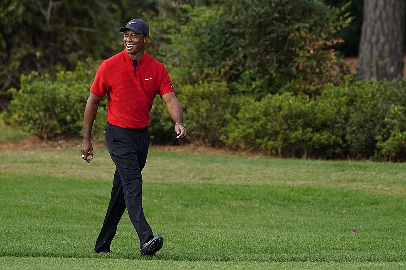 AP photo by Matt Slocum / Tiger Woods walks up the 17th fairway at Augusta National Golf Club during the final round of the Masters on Sunday.