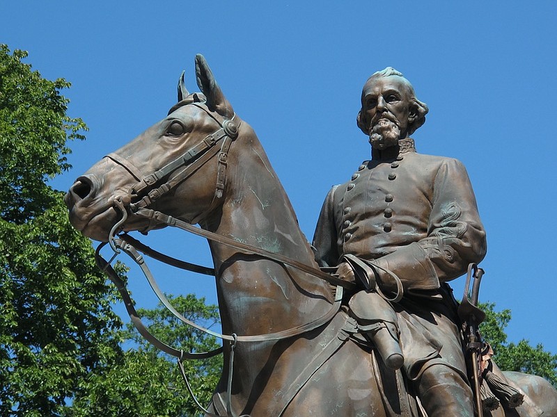 FILE - In this Aug. 18, 2017, file photo, a statue of Confederate Gen. Nathan Bedford Forrest sits in a park in Memphis, Tenn. Lawyers in Tennessee are seeking a judge's approval for the disinterment of Confederate general and slave trader Nathan Bedford Forrest's remains from his burial plot in a Memphis park, Friday, Nov. 20, 2020. (AP Photo/Adrian Sainz, File)



