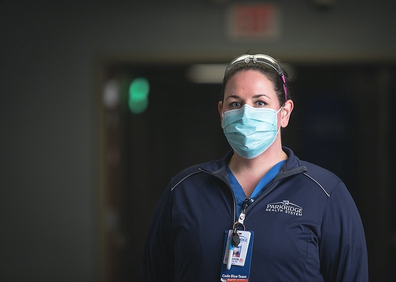 Staff photo by Troy Stolt / Bonnie Phillips, a critical care nurse in the medical intensive care unit at Parkridge, is photographed after her shift on Wednesday, Nov. 18, 2020, in Chattanooga, Tenn.
"Last week, we saw our youngest patient yet die of COVID. She was 22," Phillips said. "It's just very physically and emotionally hard to care for these patients. A lot of them are with us for a long time.  We basically try to be their family."