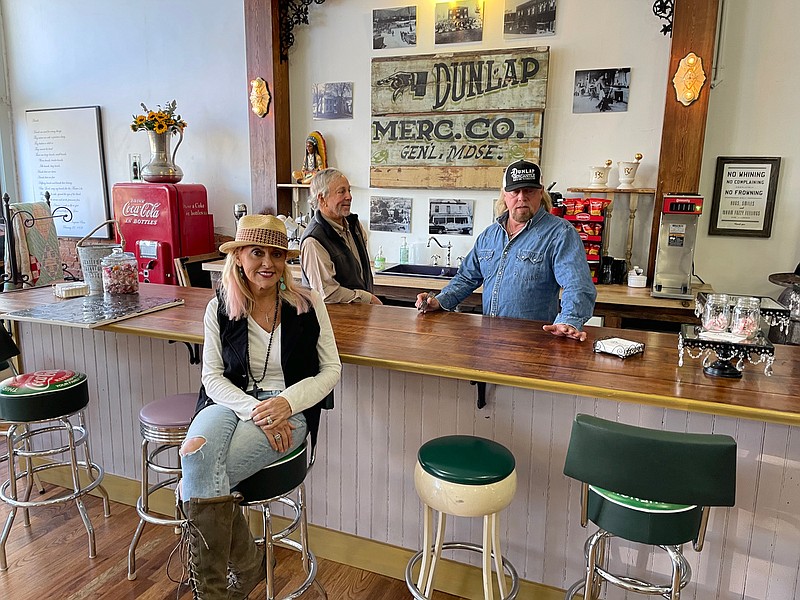 Photo by Mark Kennedy / Rebecca Card, Lewis Card and Cody McCarver, from left, are pictured inside the renovated Dunlap Mercantile Company building on Rankin Avenue in Dunlap, Tenn. on Nov. 16, 2020 The three are partnering to redo several buildings in downtown Dunlap.