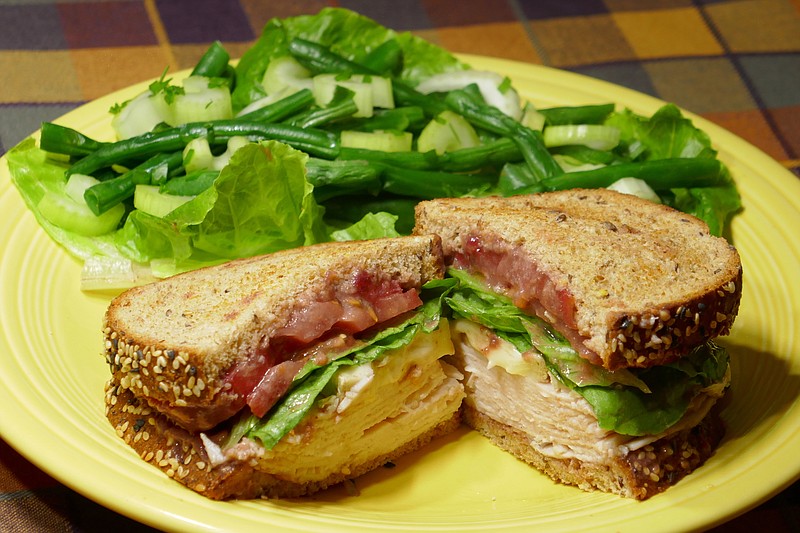 Use up the Thanksgiving leftovers in a Toasted Turkey and Cranberry Sandwich with Green Bean Salad. / Photo by Linda Gassenheimer/TNS