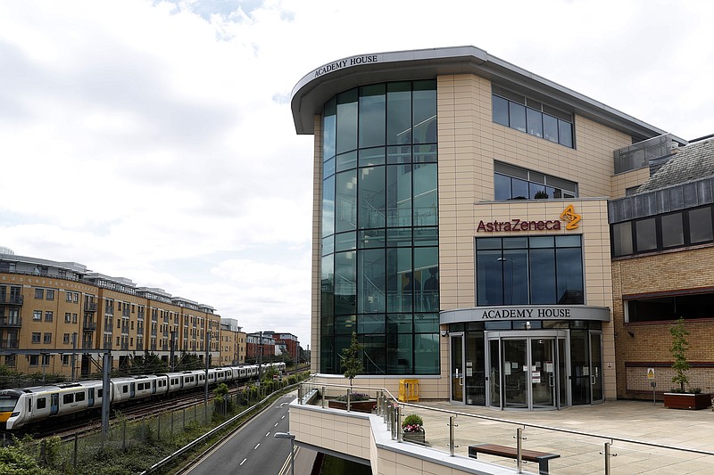 FILE - In this Saturday, July 18, 2020 file photo a general view of AstraZeneca offices and the corporate logo in Cambridge, England. AstraZeneca says late-stage trials of its COVID-19 vaccine were "highly effective'' in preventing disease. A vaccine developed by AstraZeneca and the University of Oxford prevented 70% of people from developing the coronavirus in late-stage trials, the team reported Monday Nov. 23, 2020.(AP Photo/Alastair Grant, File)

