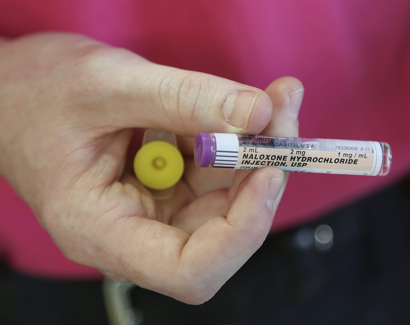 Staff Photo by Dan Henry / The Chattanooga Times Free Press- 10/20/16. Hamilton County EMS Station 9 Paramedic Ian Stearns explains how Narcan works on Thursday, October 20, 2016.