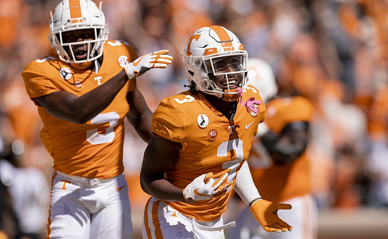 Tennessee Athletics photo by Andrew Ferguson / Tennessee football players such as running back Eric Gray, right, and receiver Josh Palmer, left, will go at least two months between victories due to postponements and schedule rearrangements that have extended the Vols' five-game losing streak.