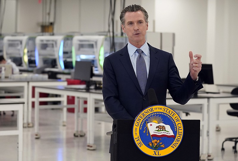 Photo by Marcio Jose Sanchez, pool, The Associated Press / California Gov. Gavin Newsom, shown here in this file photo speaking at a COVID-19 testing facility in Valencia, California, on Oct. 30, 2020, apologized on Monday, Nov. 16, 2020, for what he called "a bad mistake" in attending a birthday party that broke the very rules that he has been preaching to slow the spread of the coronavirus.