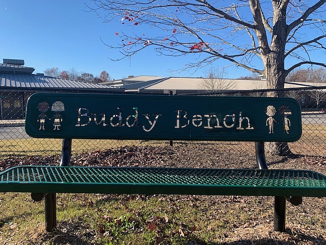 This Buddy Bench sits on the playground at Nolan Elementary School.