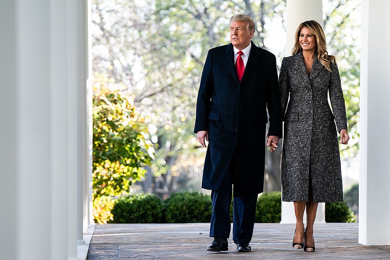 Photo by Erin Schaff of The New York Times / President Donald Trump and first lady Melania Trump walk to the annual presidential turkey pardoning ceremony in the Rose Garden of the White House in Washington on Tuesday, Nov. 24, 2020.