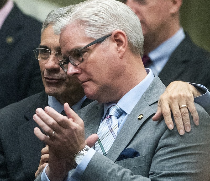 FILE - In this Thursday, April 25, 2019, file photo, Sen. Del Marsh, left, chats with Sen. Greg Reed on the senate floor as debate on the lottery bill is set to begin in the Alabama Statehouse in Montgomery, Ala. The Alabama Senate in February 2021 will have a new leader for the first time in a decade. Republican Sen. Greg Reed of Jasper will take the helm as president pro tempore. Reed said in a telephone interview Tuesday, Nov. 24, 2020, that rebuilding the state's economy and alleviating the impact of the coronavirus pandemic will be his initial priorities. (Mickey Welsh/The Montgomery Advertiser via AP, File)